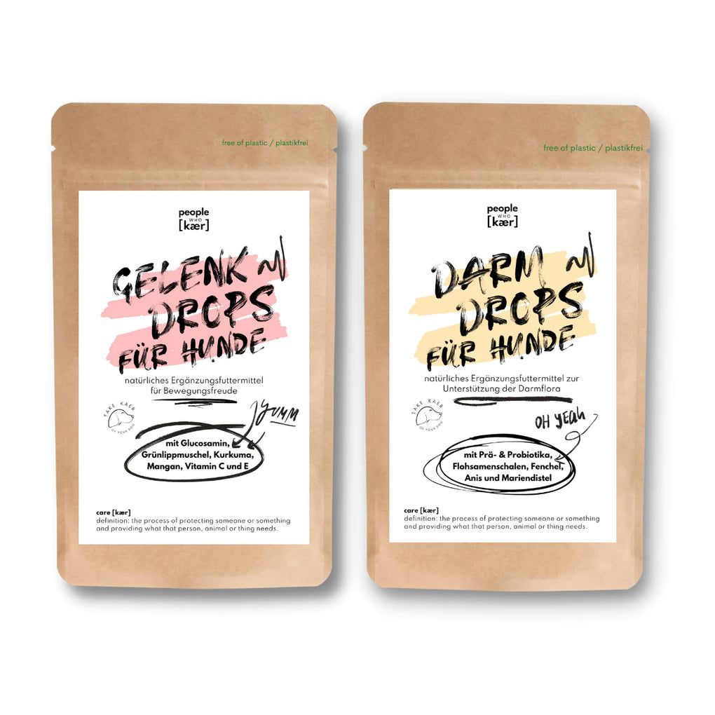 Zwei Beutel mit Aufschrift "Gelenk Drops für Hunde" und "Darm Drops für Hunde". Natürliche Ergänzungsfuttermittel.