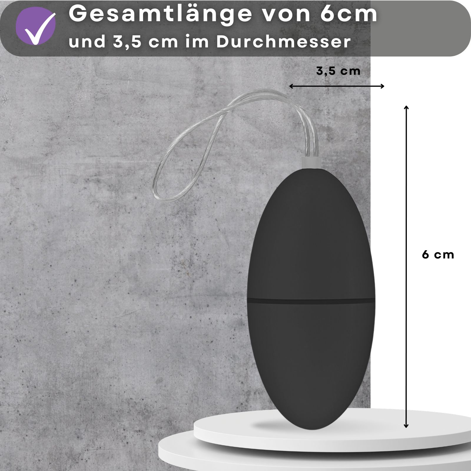 Schwarzer Ei-Vibrator mit Schnur. Maße: 6 cm lang, 3,5 cm Durchmesser. Text mit Maßen.
