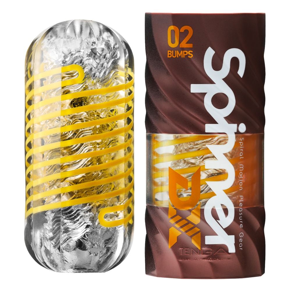 Zylindrisches Produkt mit gelben Spiralen und Verpackung. Aufschrift: Spinner DX 02 Bumps.