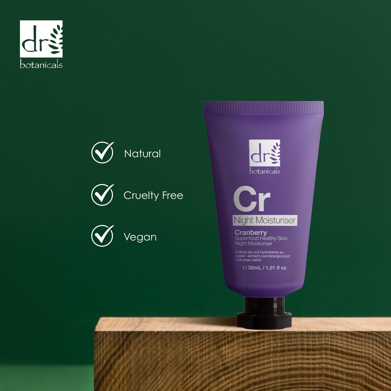 Lila Tube auf Holzblock. Text: Natural, Cruelty Free, Vegan. Dr Botanicals, Cr, Night Moisturiser, Cranberry Superfood Healthy Skin Night Moisturiser.