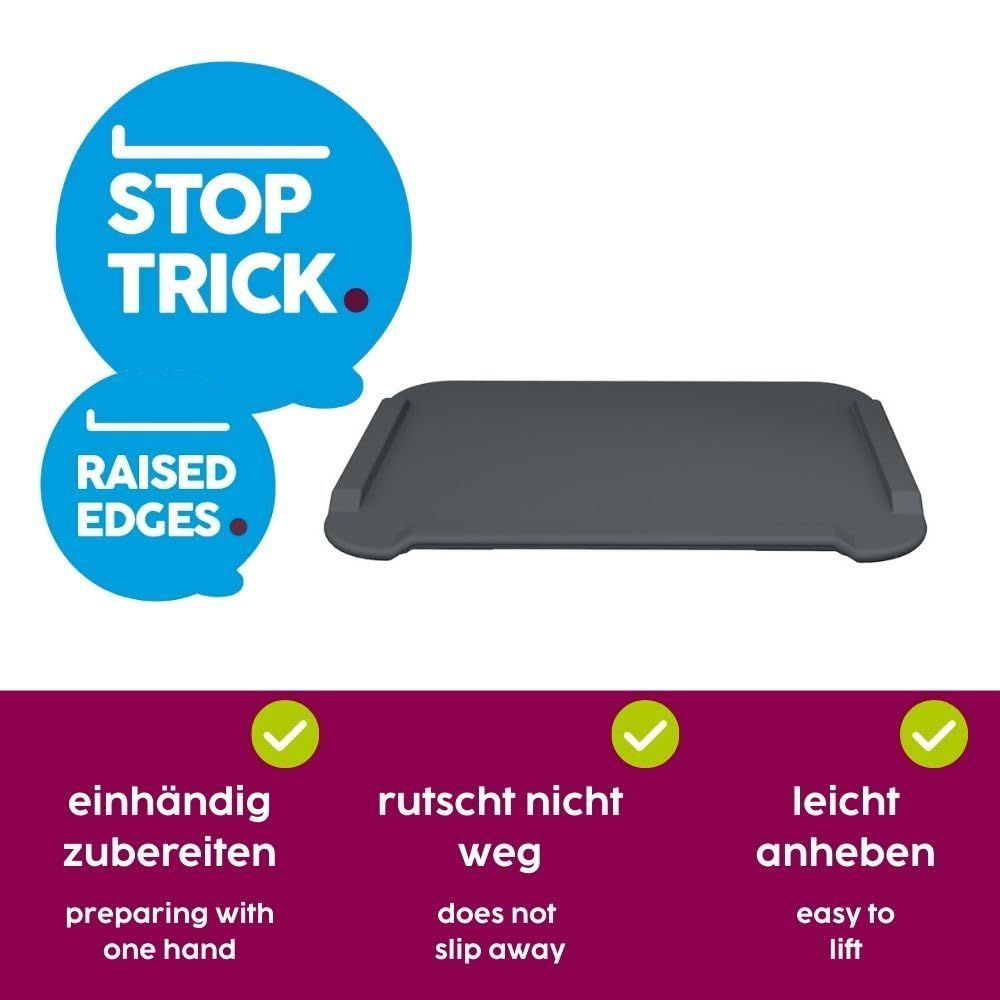 Graues Schneidebrett mit erhöhten Rändern. "Raised Edges" und "Stop Trick".
