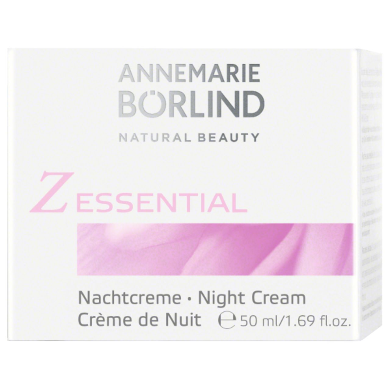 Weiße Schachtel mit Aufschrift: ANNEMARIE BÖRLIND, Z Essential Nachtcreme. Blütenmotiv. 50 ml.