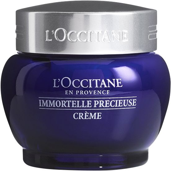 L'Occitane Immortelle Creme Precieuse in blauem Glasbehälter mit silbernem Deckel.