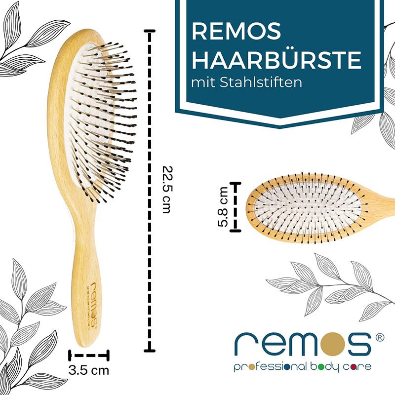 REMOS Haarbürste: Breite 22.5cm, Höhe 5.8cm, Griffbreite 3.5cm. Aus Buchenholz mit Stahlstiften.