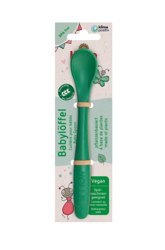 Grüner Holle Babylöffel mit braunen Ringen. Text: Baby Spoon, pflanzenbasiert, vegan, spülmaschinengeeignet.