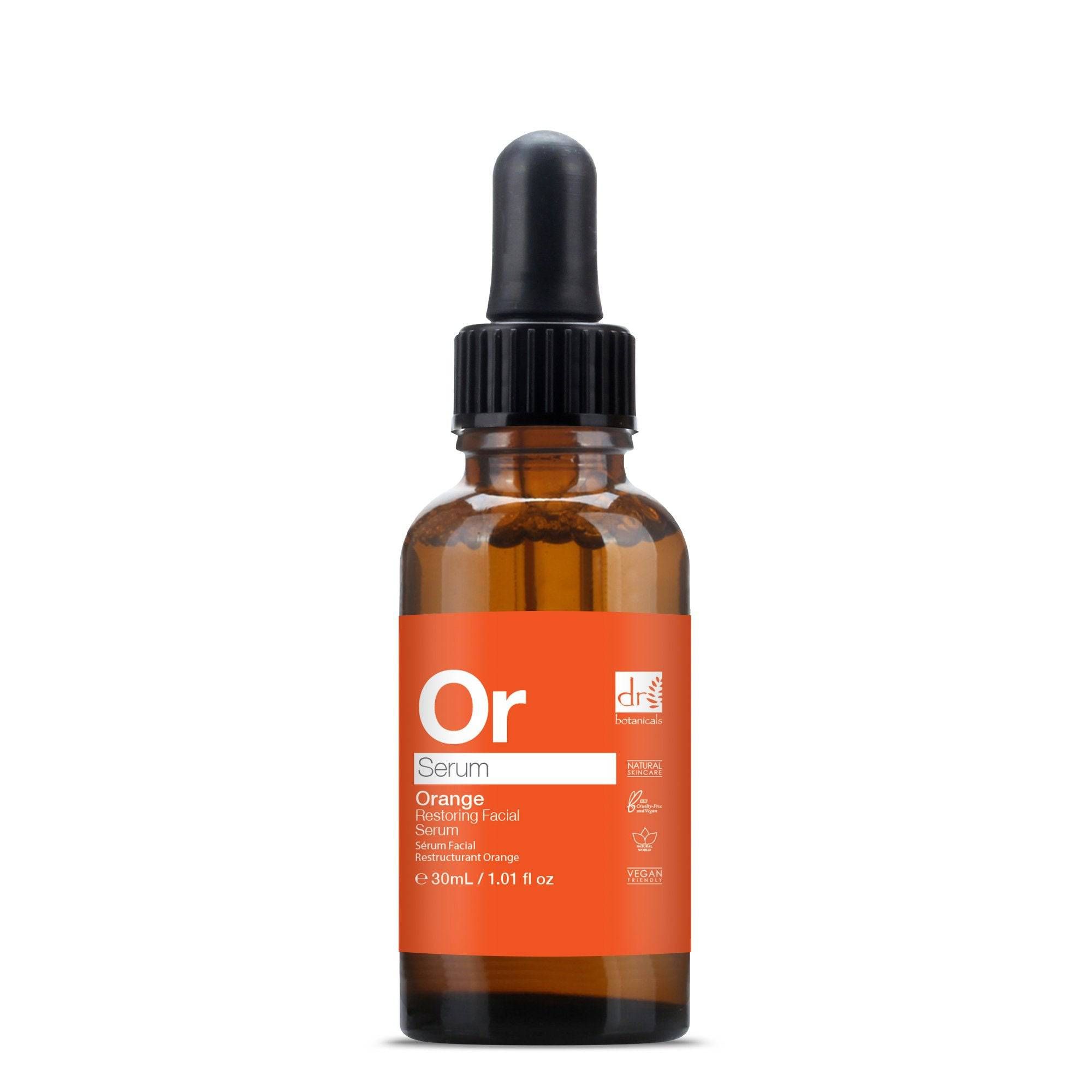 Braune Glasflasche mit Pipette. Orangefarbenes Etikett mit "Or Serum" und Produktinformationen. "Dr Botanicals" Logo.