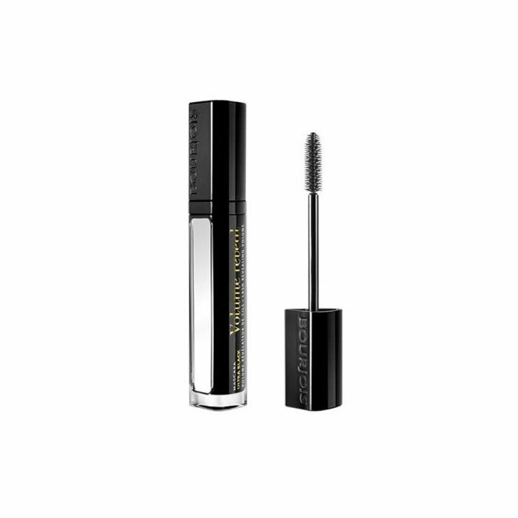 Schwarze Mascara-Tube mit Bürste. Aufschrift: Volume Reveal. Bürste mit Borsten. Silberne und goldene Details.