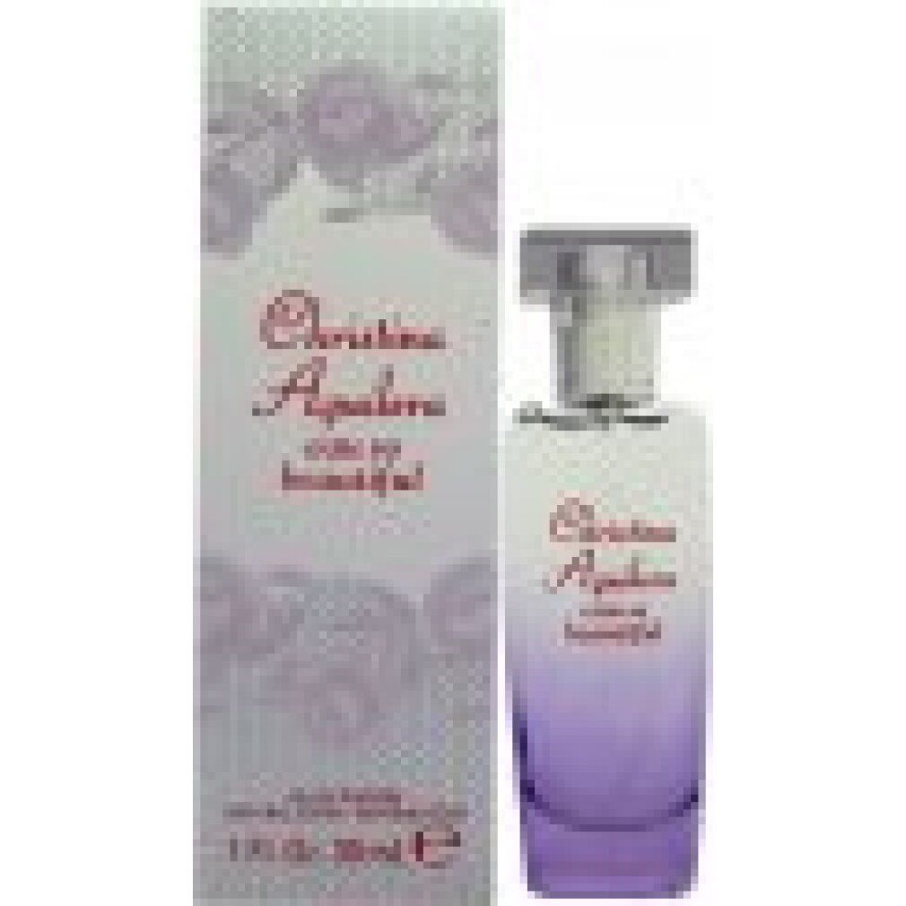 Christina Aguilera Eau So Beautiful Flakon mit Verpackung. Flakon mit violettem Farbverlauf, Verpackung mit Rosenmuster.