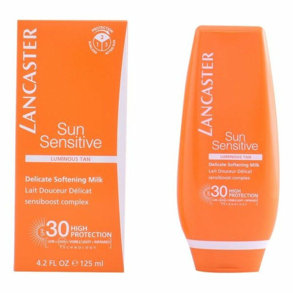 Orange Tube und Schachtel. Lancaster Sun Sensitive Luminous Tan SPF 30. Milch. Text.