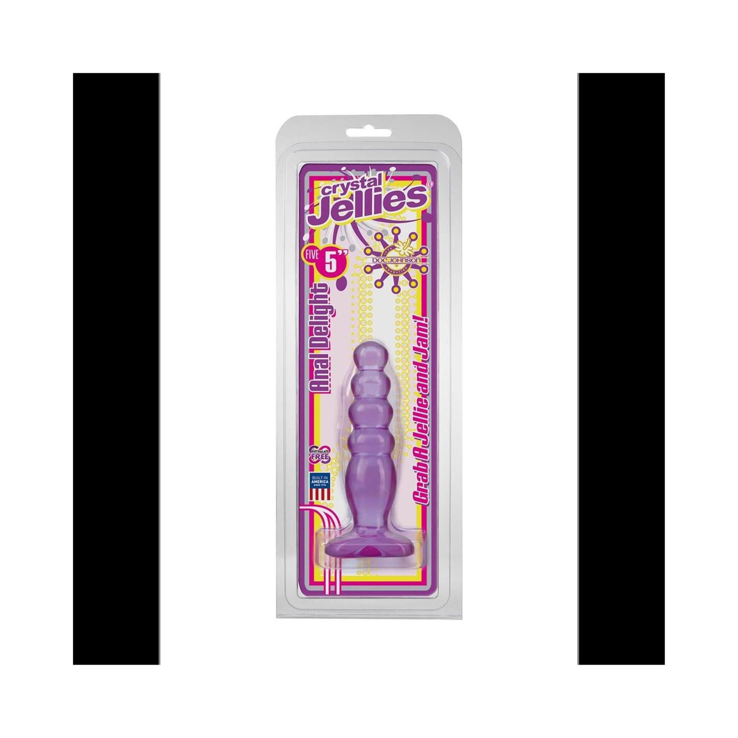 Lila Anal-Plug in Verpackung. Produktname: Anal Delight. Größe 5. Verpackung mit Produktinformationen.