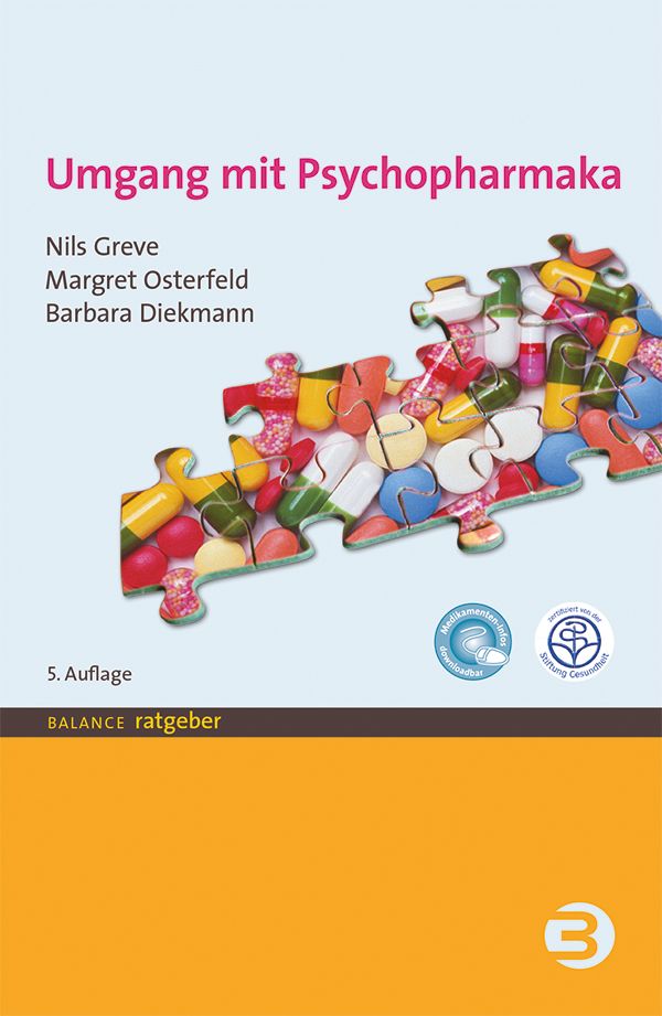 Buchcover: Umgang mit Psychopharmaka. Titel, Autoren, Puzzleteile mit Pillen. Logos und "BALANCE ratgeber".