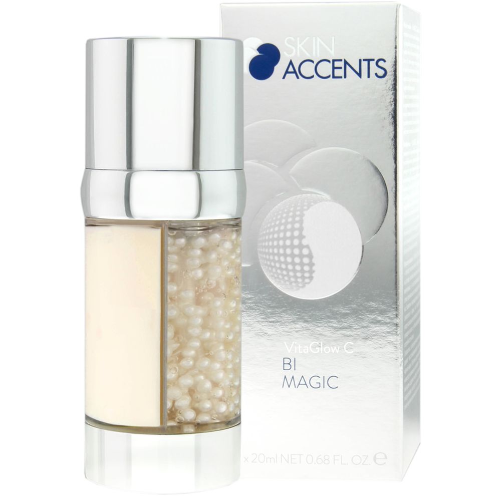 Kosmetikflasche mit silbernem Deckel und Verpackung. Aufschrift: Skin Accents, VitaGlow C Bi Magic.