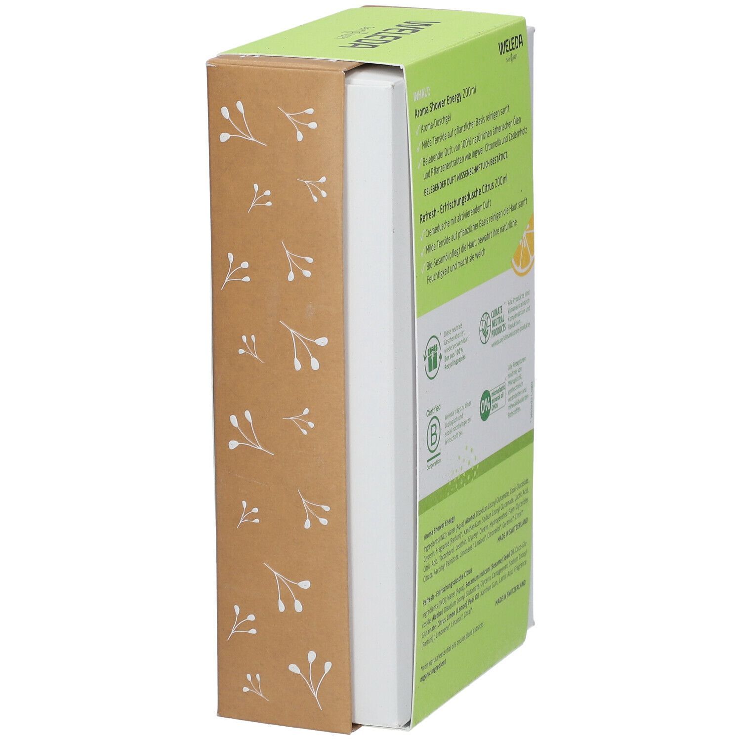 Seitenansicht des Weleda Geschenksets. Aufschrift: Weleda, Geschenk für deine Sinne. Text und Zertifizierungen sichtbar.