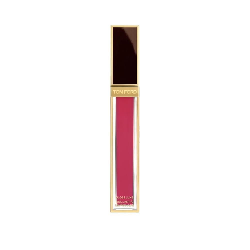 Lipgloss-Tube mit goldfarbenem Deckel. Rosa Inhalt. Marke Tom Ford.