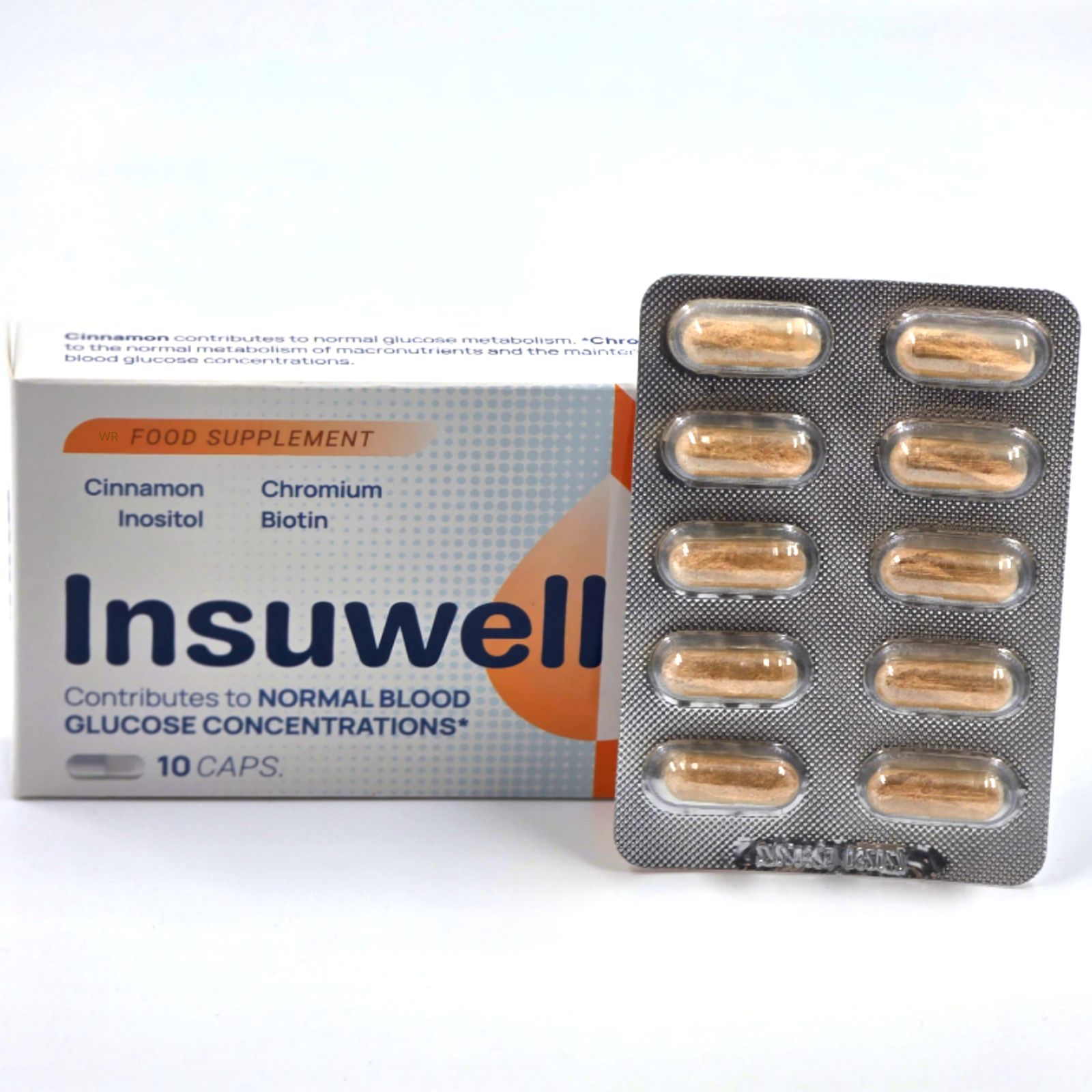 Packung "Insuwell"-Kapseln und Blisterpackung mit Kapseln. 10 Kapseln. Aufschrift: "Nahrungsergänzungsmittel". Zutaten: Zimt, Inositol, Chrom, Biotin.