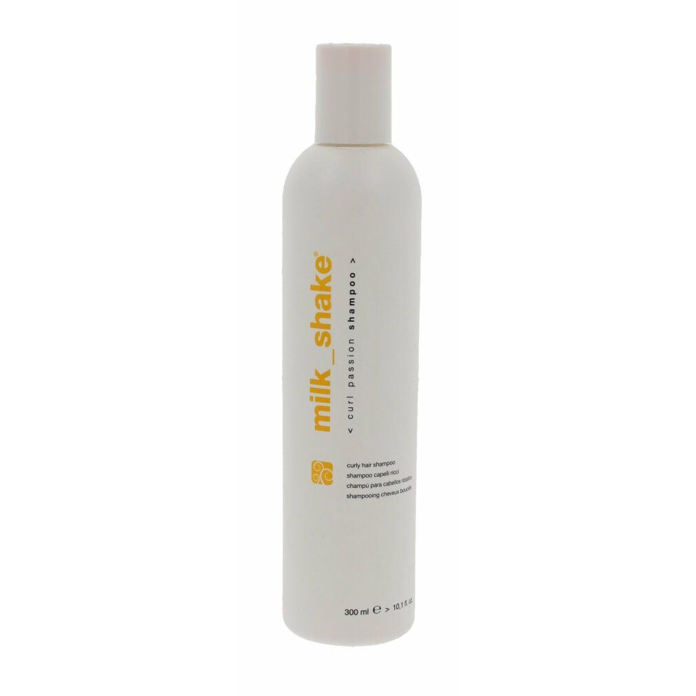 Weißes Shampoo mit gelbem Schriftzug: milk_shake curl passion shampoo. Mehrere Textzeilen darunter. Weißer Deckel.
