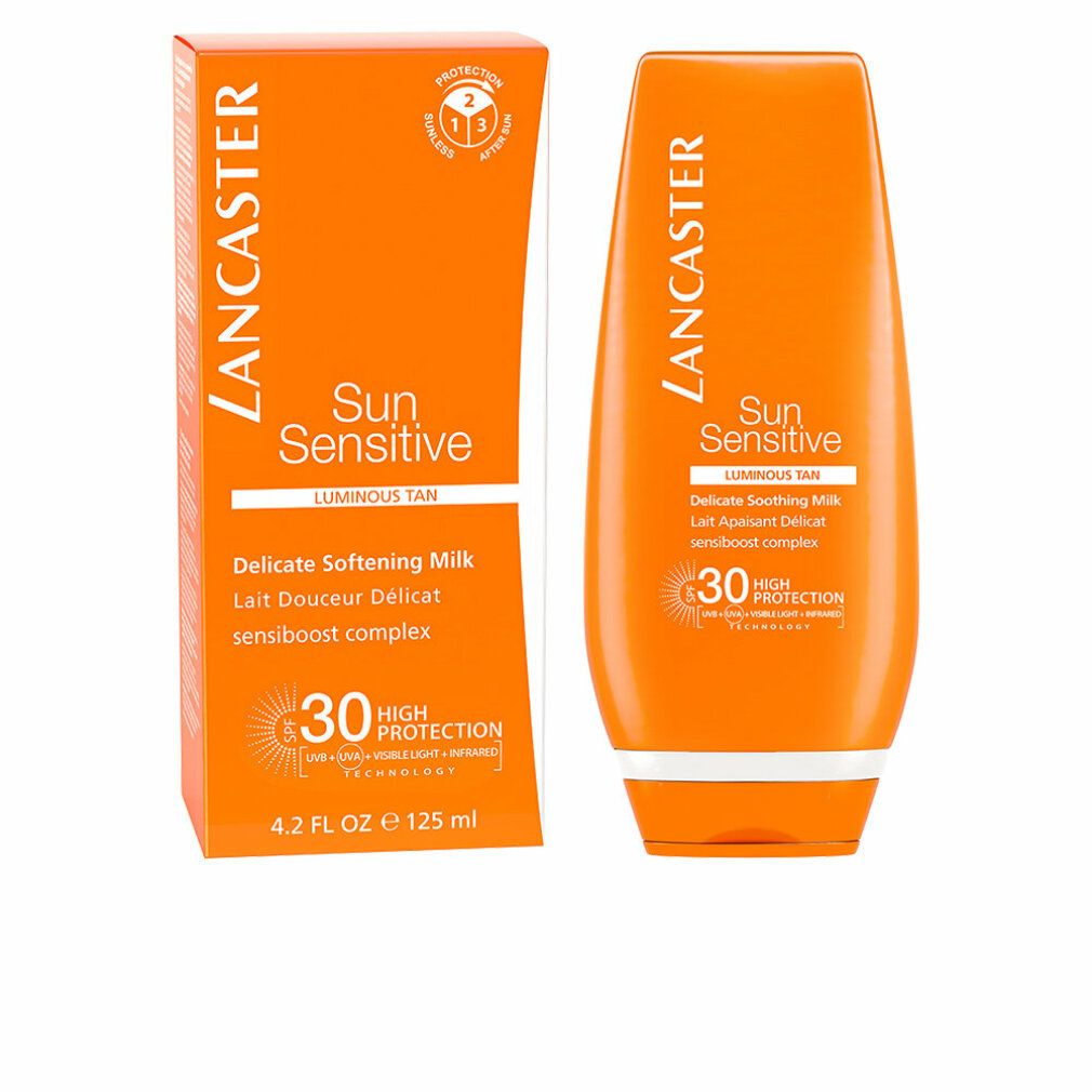 Orange Tube und Schachtel. Lancaster Sun Sensitive Luminous Tan SPF 30. Milch. Text.