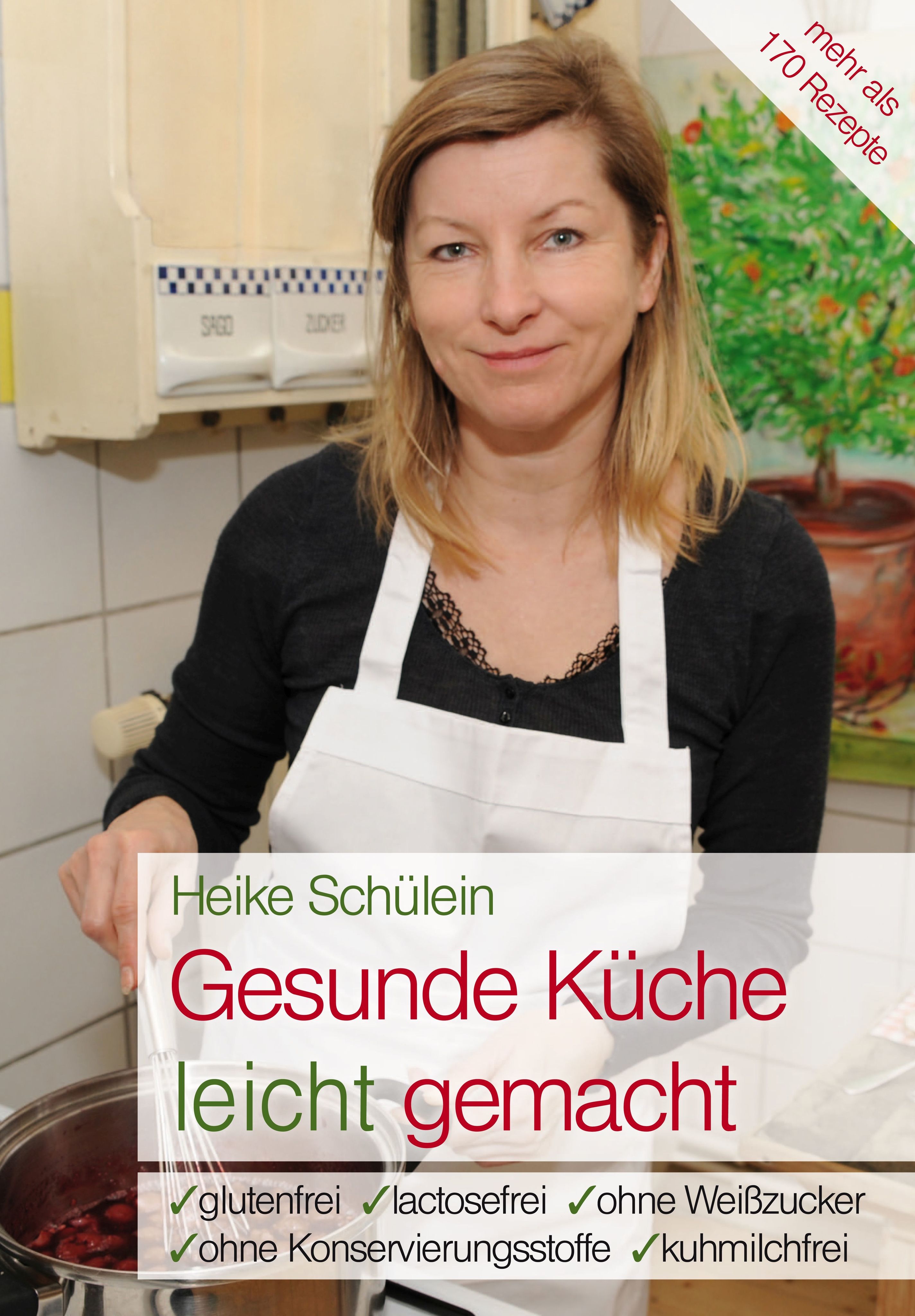 Frau mit Kochschürze. Titel: Gesunde Küche leicht gemacht. Enthält glutenfreie, laktosefreie, zuckerfreie und konservierungsstofffreie Rezepte.