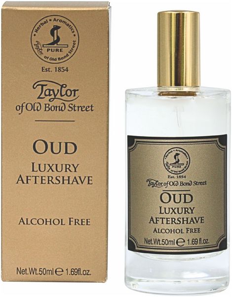 Produktflakon und Verpackung nebeneinander. Flakon mit goldfarbenem Verschluss. Etikett mit Produktbezeichnung und Marke.