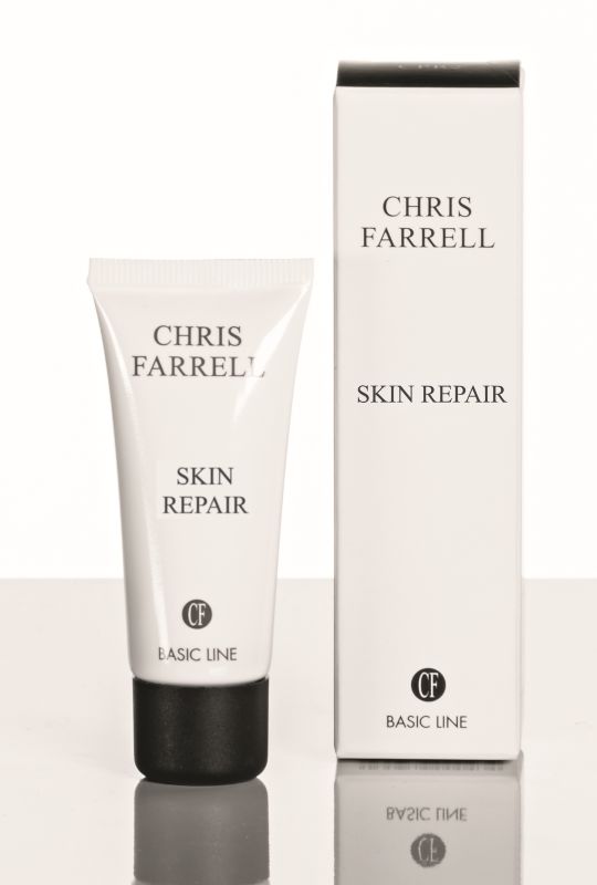 Weiße Tube und Schachtel mit Aufschrift CHRIS FARRELL SKIN REPAIR. Schwarzer Verschluss. Logo CF.