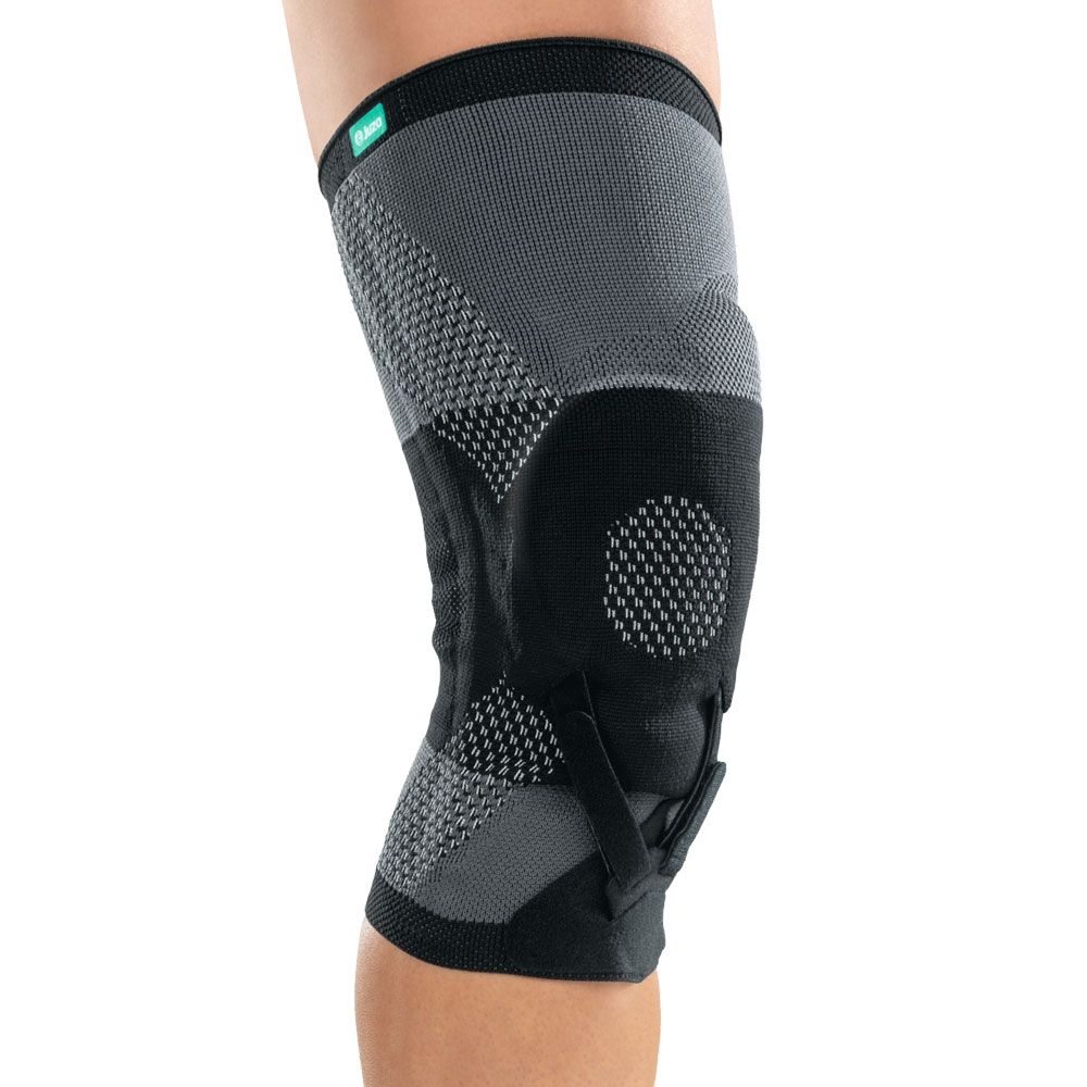 Schwarze und graue Kniebandage mit Kompressionsstrick und seitlichen Stabilisatoren.