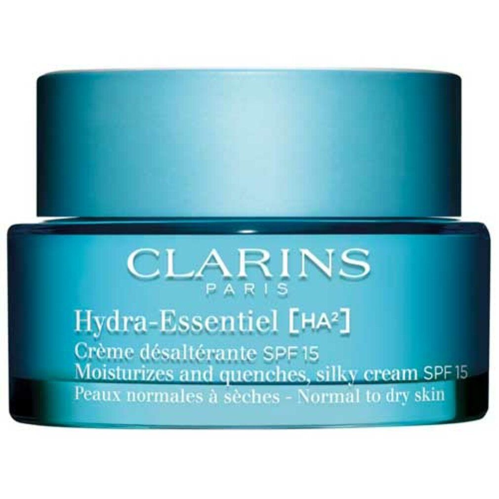 Blaues Tiegel mit Deckel. Aufschrift: Clarins Paris, Hydra-Essentiel, Crème désaltérante SPF 15. Für normale bis trockene Haut.