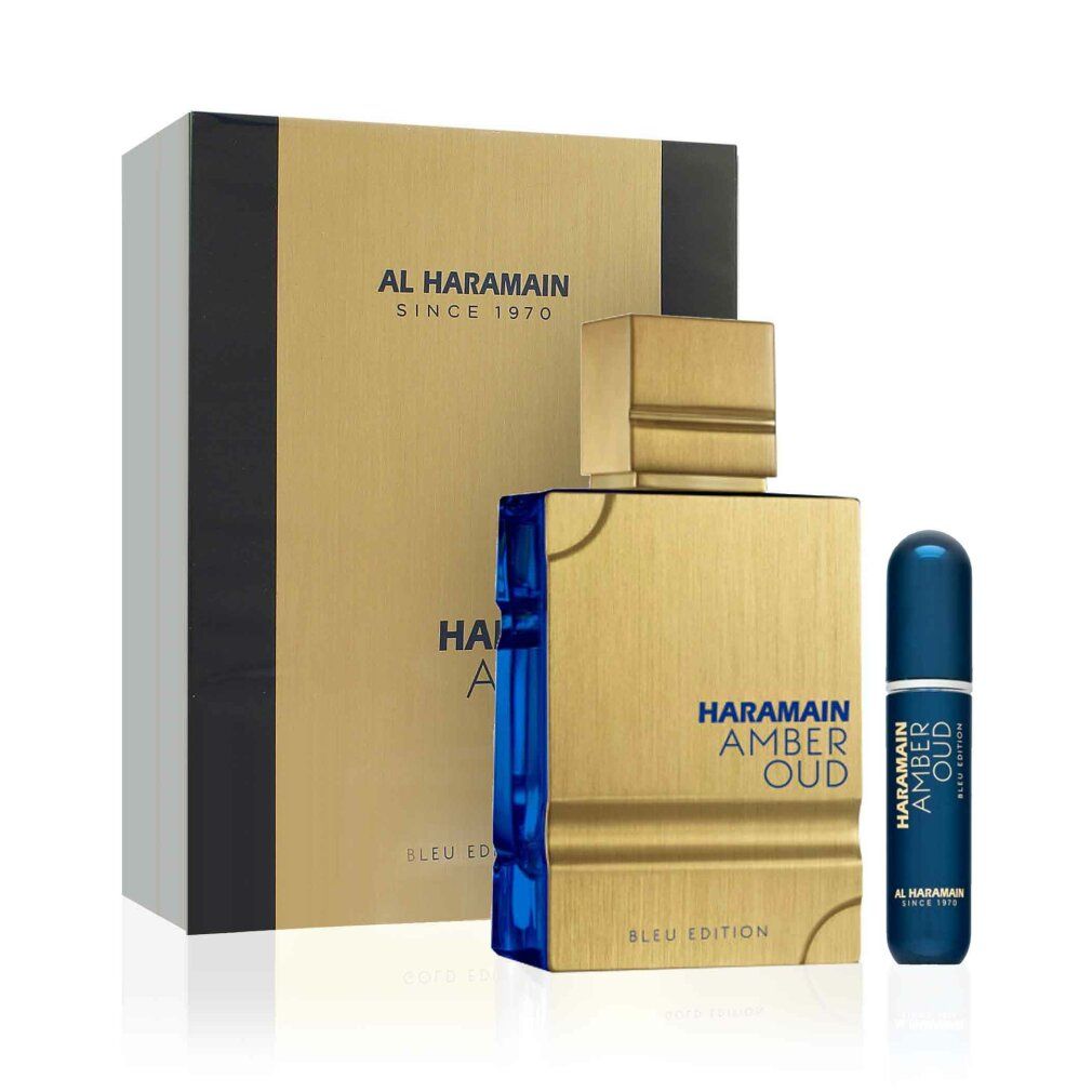 Goldfarbener Flakon mit blauen Elementen, Verpackung und Zerstäuber. Aufschrift: HARAMAIN AMBER OUD BLEU EDITION. Marke: AL HARAMAIN.
