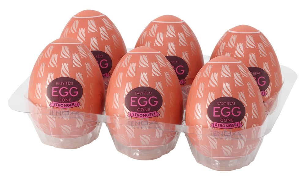 Sechs orangefarbene, ei-förmige Produkte in einer transparenten Verpackung. Aufschrift: "EGG CONE STRONGER!".