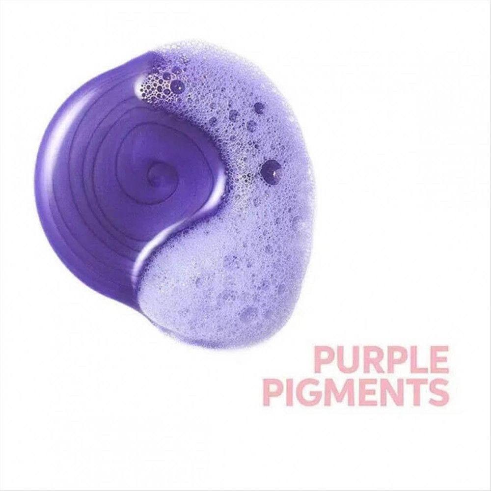 Kreisförmiger lila Shampoo-Klecks mit Schaum. Text: Purple Pigments.