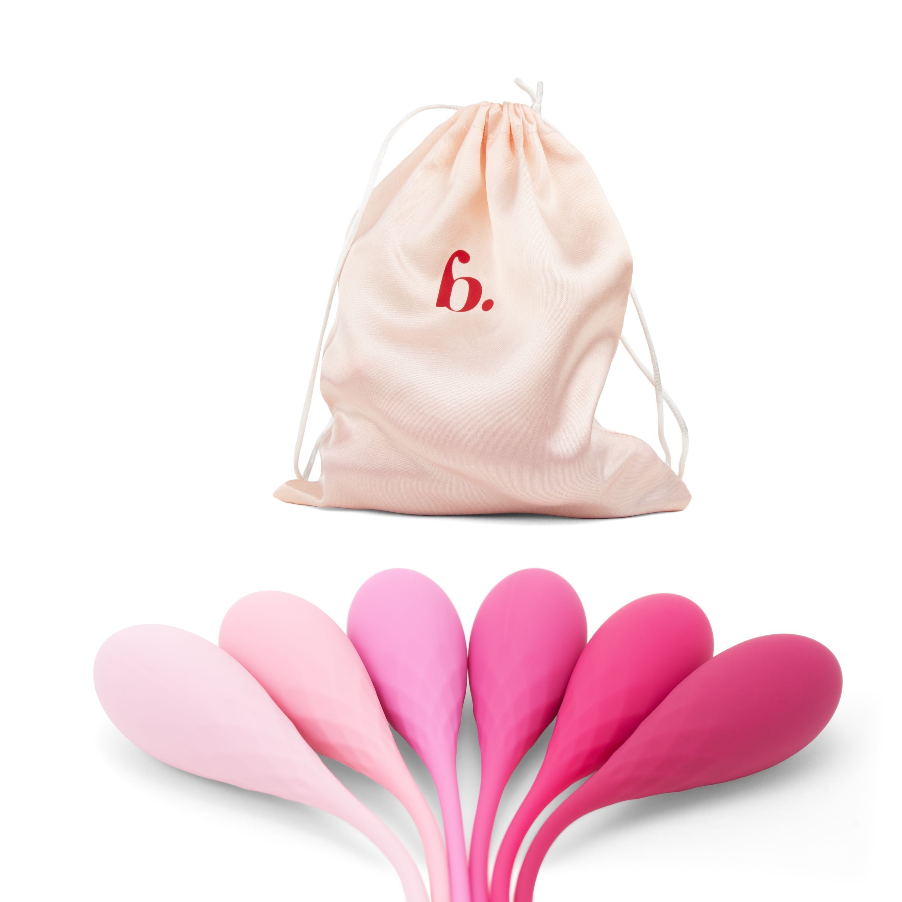 Set aus sechs Kegelgewichten in verschiedenen Rosatönen. Mit Beutel mit rotem Logo 'b.'
