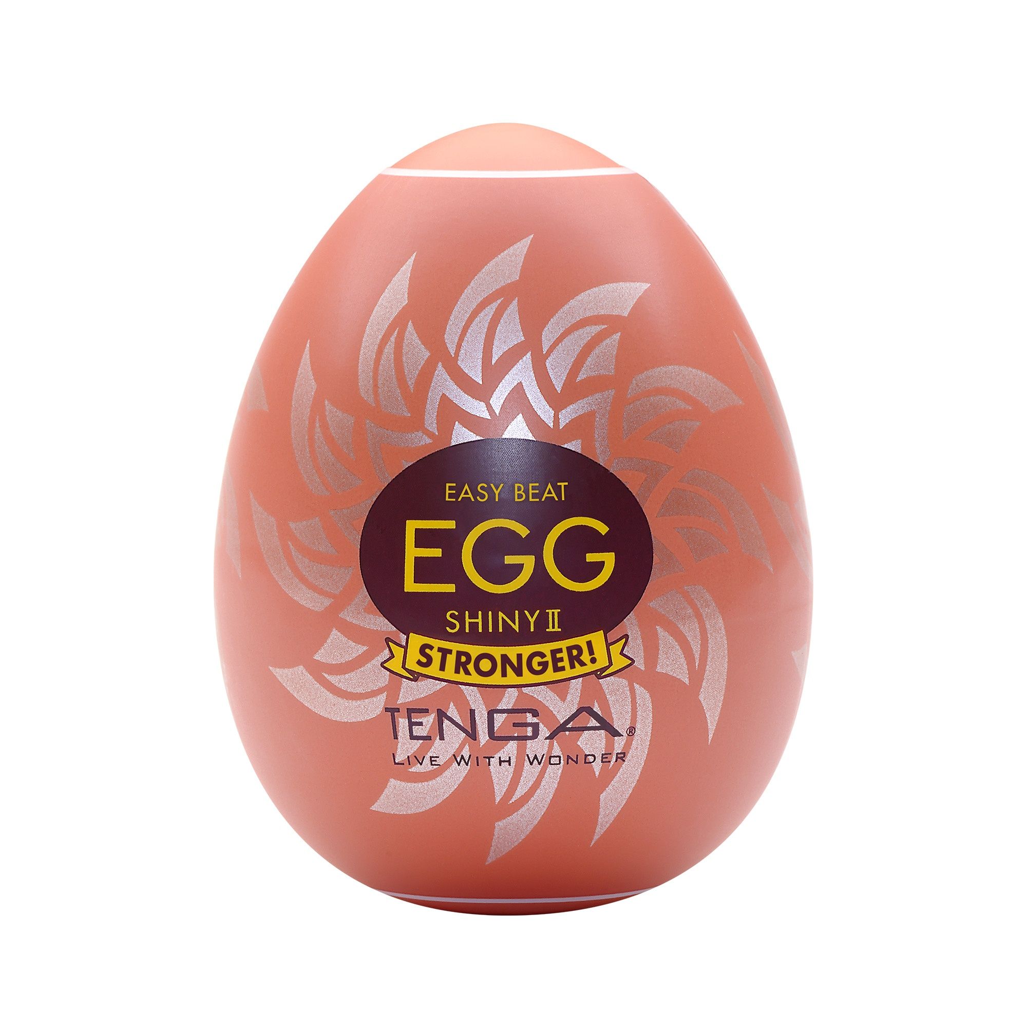 Ei-förmiges Produkt in orangefarbener Verpackung. Aufschrift: EASY BEAT EGG SHINY II STRONGER! Marke TENGA.