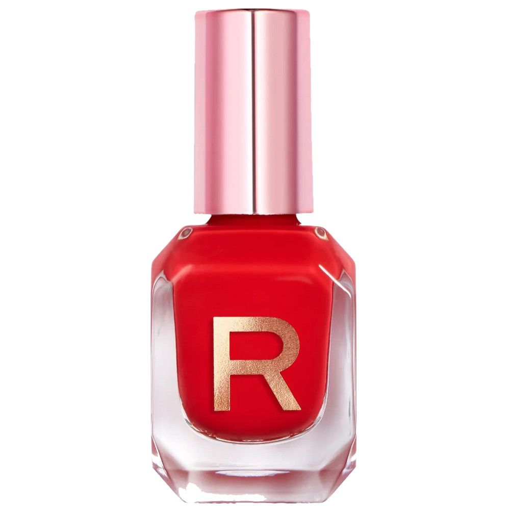 Roter Nagellackflakon mit rosafarbenem Deckel. Goldfarbenes "R" auf dem Flakon. Klarer, achteckiger Flakon.