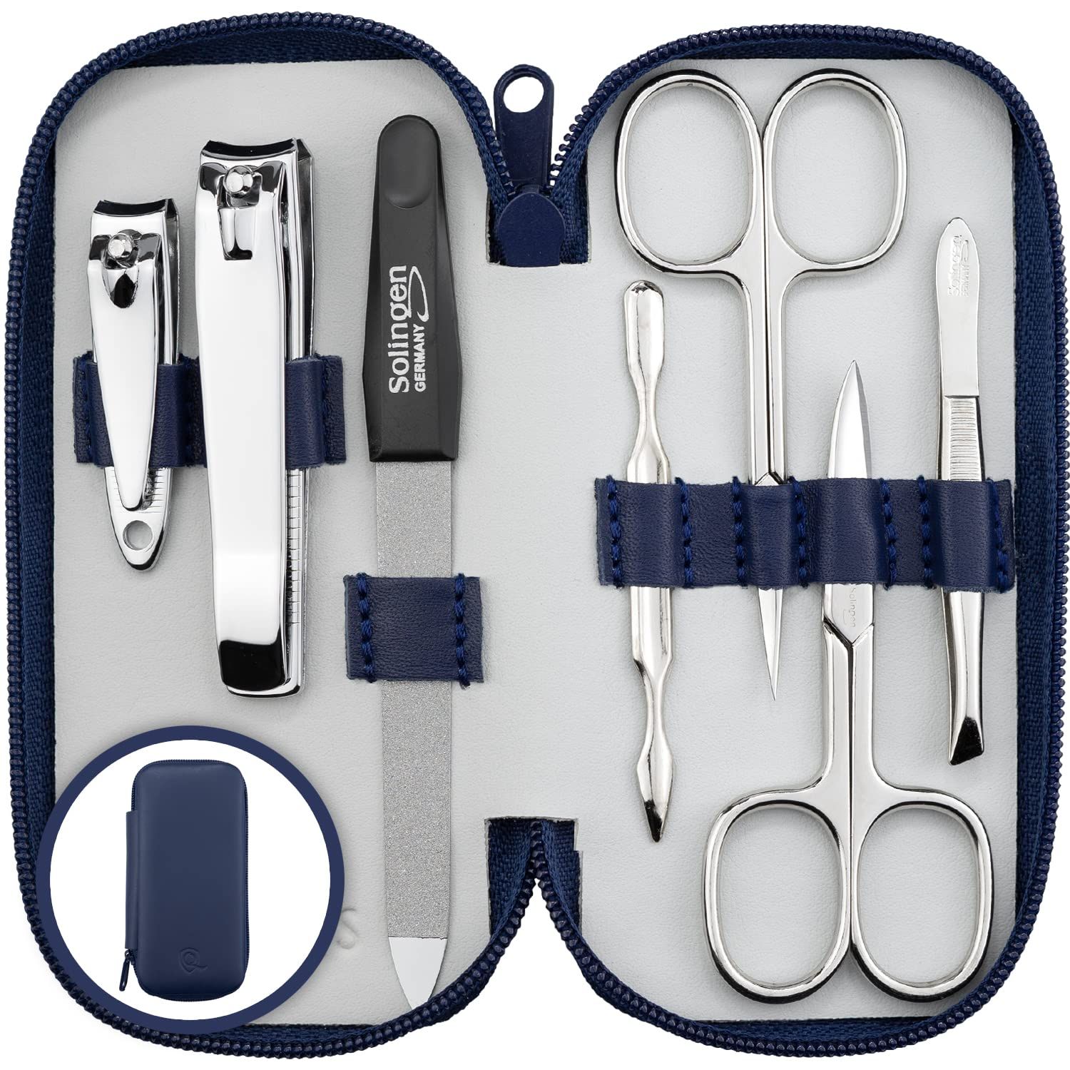 Maniküre-Set in dunkelblauem Etui. Enthält Nagelscheren, Feile, Nagelknipser und weitere Werkzeuge. Marke Solingen.
