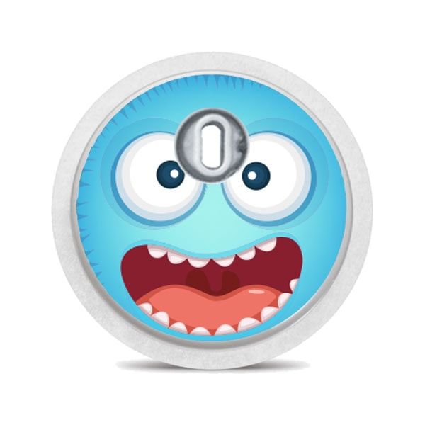 Runder Aufkleber mit blauem Monstergesicht. Großer Mund, Zähne, Augen. Mit silbernem Applikator.