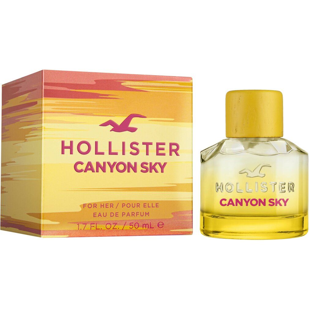 Hollister Canyon Sky for Her Eau de Parfum. Flakon und Verpackung. Gelb-orange Farbgebung. Aufschrift: Canyon Sky, 1.7 FL. OZ./50 ml.