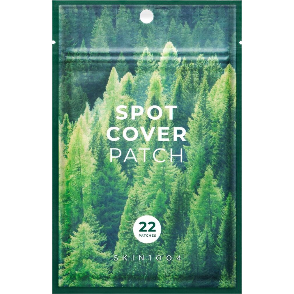 Verpackung mit 22 Fleckenschutz-Pflastern. Dunkelgrüner Hintergrund mit Waldmotiv.