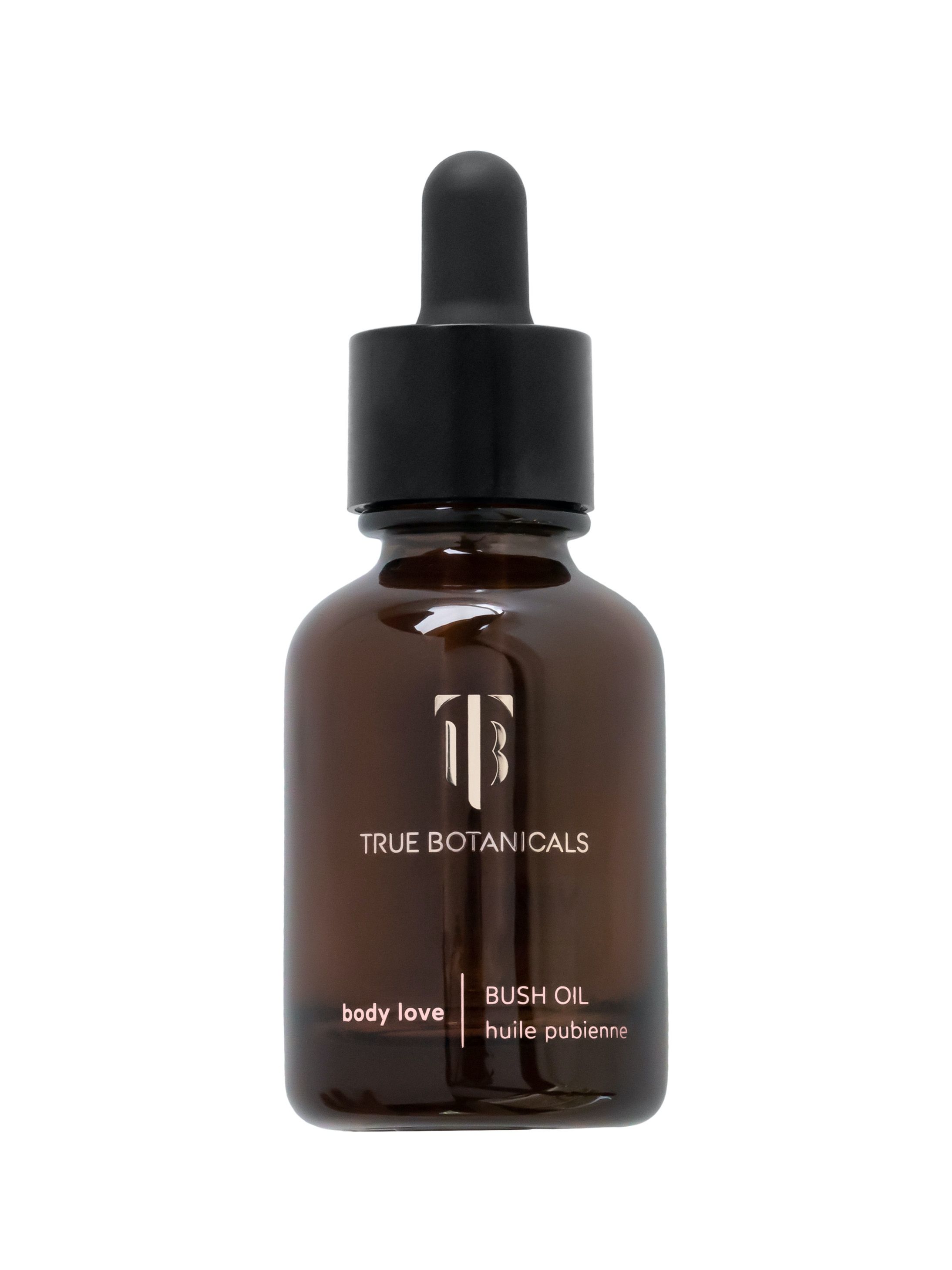 Braune Glasflasche mit schwarzem Deckel und Pipette. Aufschrift: True Botanicals, Bush Oil, body love, huile pubienne.