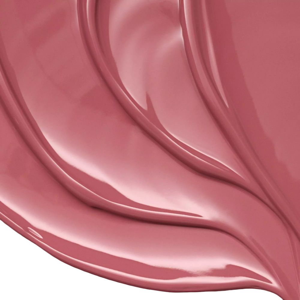 Nahaufnahme von Lippenstift. Rosa Farbton. Glänzende Textur. Auf weißem Hintergrund.