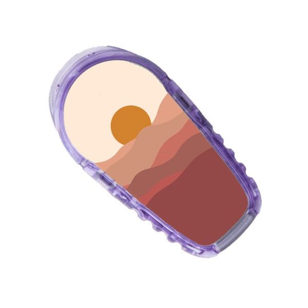 Aufkleber mit Berg- und Sonnenmotiv. Lila Umrandung. Braune und beige Farbtöne.