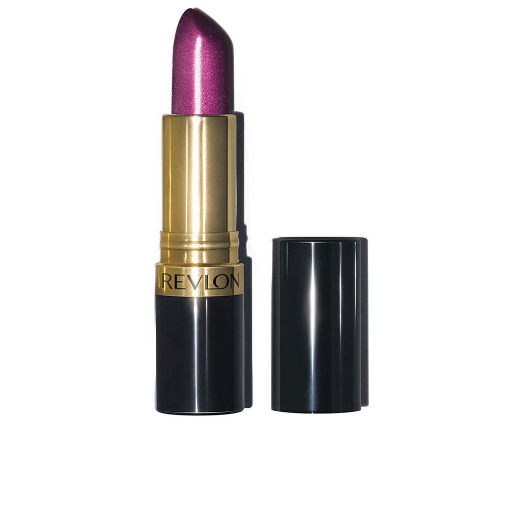 Lippenstift mit schwarzem Boden, goldener Mitte und pinkfarbener Spitze. Deckel daneben.
