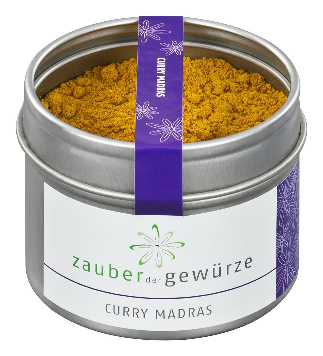 Runde Metallbox mit Curry Madras. Lila Band mit Schriftzug. Weißes Etikett mit Logo und Produktname.