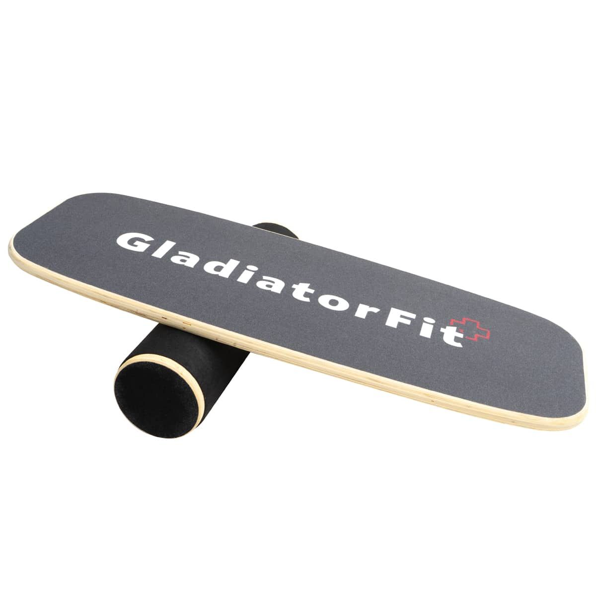 Balance Board aus Holz mit Rolle. Graue Oberfläche mit weißem Schriftzug GladiatorFit und rotem Kreuz. Schwarze Rolle.