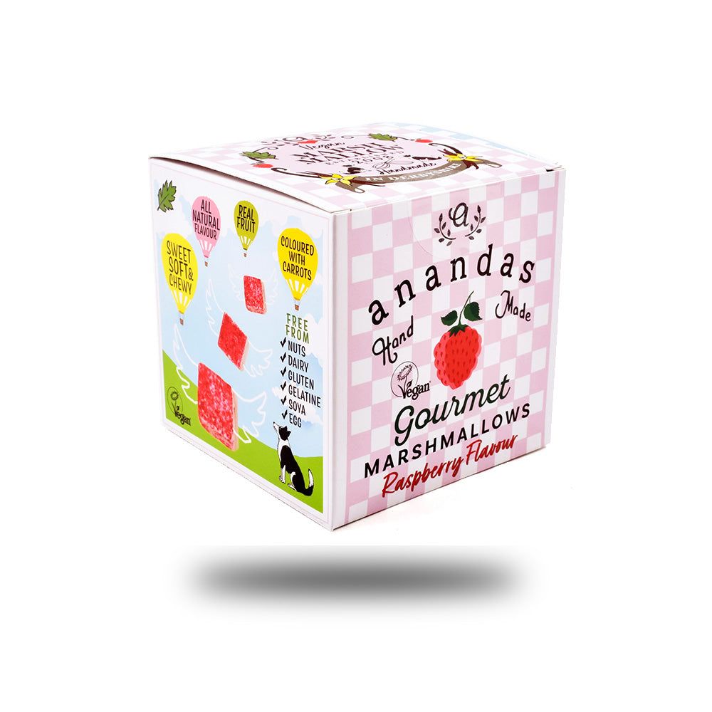 Verpackung von Himbeer-Marshmallows. Rosa karierte Schachtel mit Aufdrucken. Vegan, glutenfrei, ohne Nüsse, Soja, Gelatine und Eier.