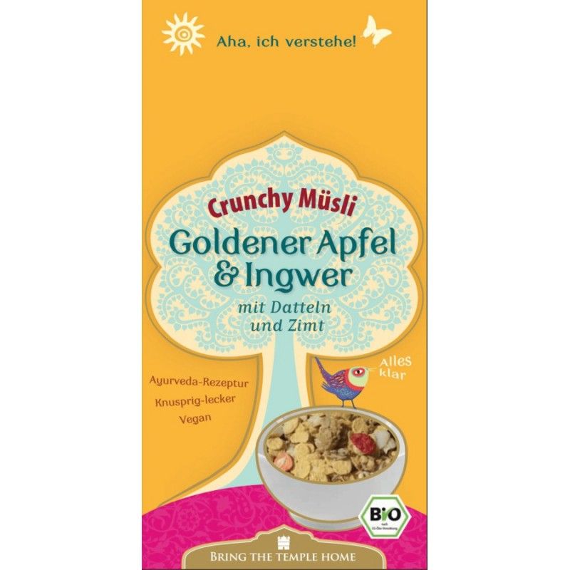 Verpackung von Crunchy Müsli mit Apfel & Ingwer. Enthält Datteln und Zimt. Bio-Siegel. Text: Ayurveda-Rezeptur, Knusprig-lecker, Vegan.