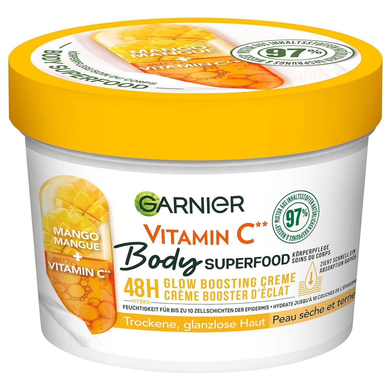 Weißer Tiegel mit gelbem Deckel. Aufschrift: Garnier Vitamin C Body Superfood. Mango-Abbildung. 97% Inhaltsstoffe natürlichen Ursprungs.