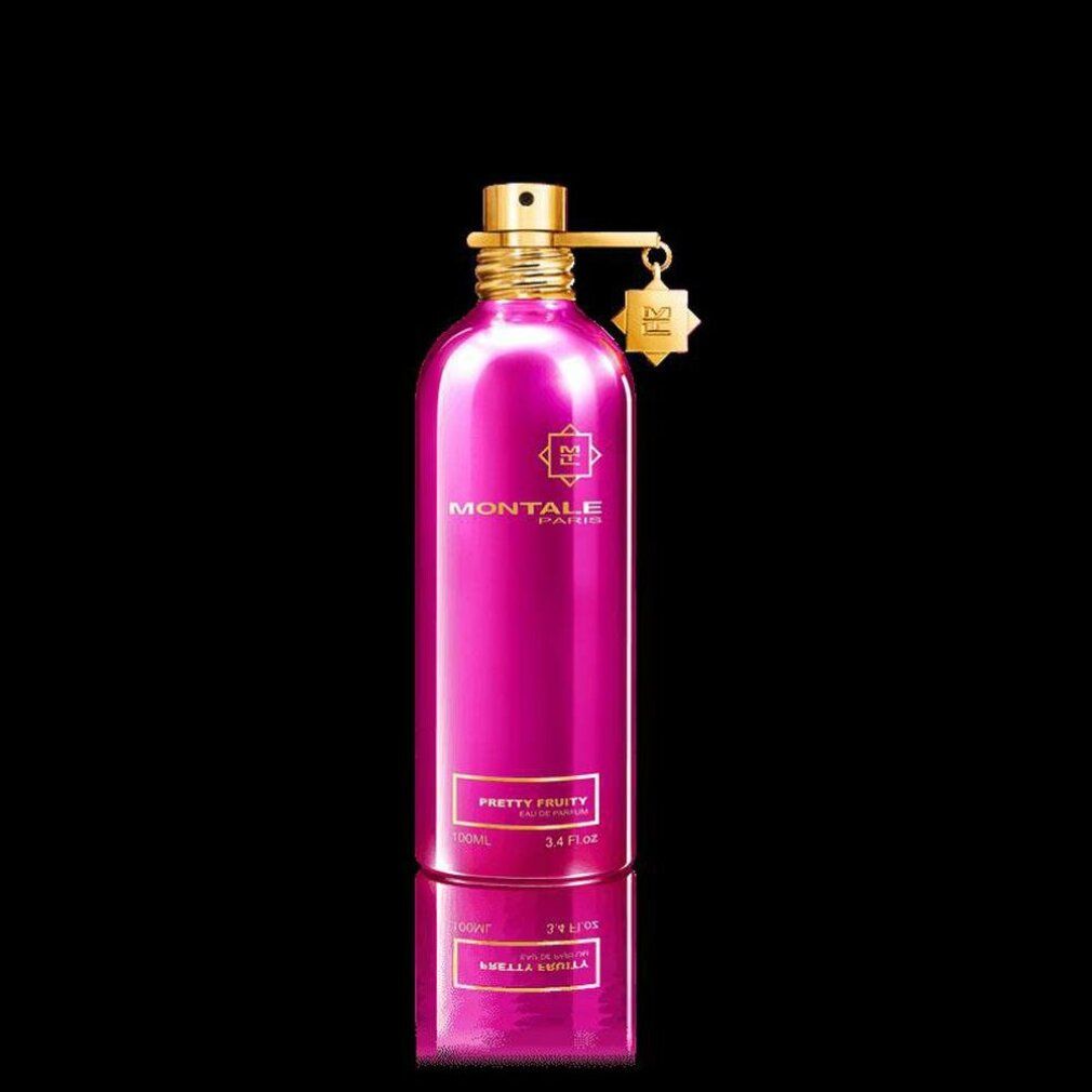 Pinkfarbene Flasche mit goldenem Verschluss und Anhänger. Aufschrift: MONTALE PARIS, PRETTY FRUITY. 3.4 fl oz. Spiegelung.