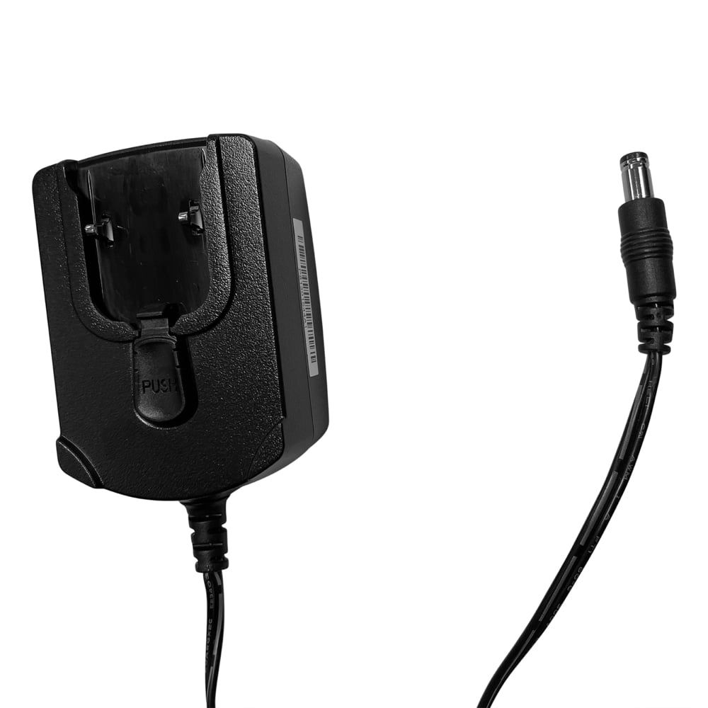 Schwarzes Netzteil mit Stecker und Kabel. Auf dem Adapter ist ein Anschluss für ein Gerät zu sehen. Auf dem Adapter steht "PUSH".