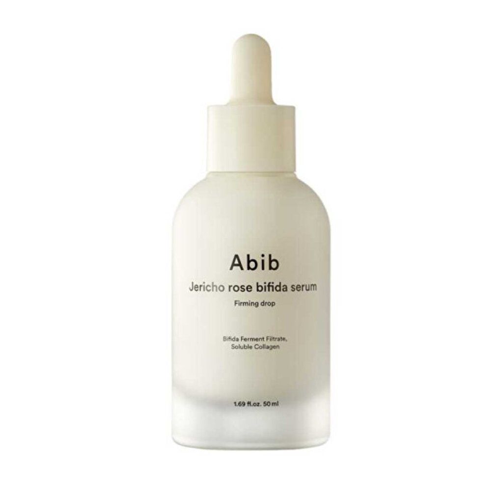 Abib Jericho Rose Bifida Serum Flasche mit Pipettenverschluss. Milchiges Glas mit weißem Etikett.