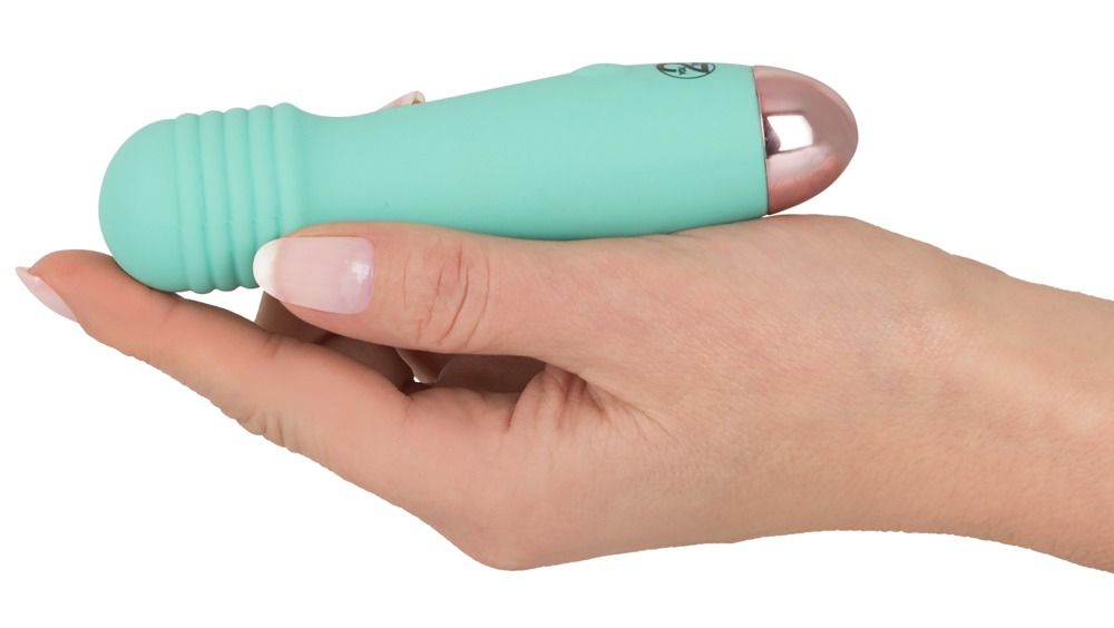 Mintgrüner Cuties Groove Mini Taschenvibrator mit Ladekabel und USB-Anschluss.