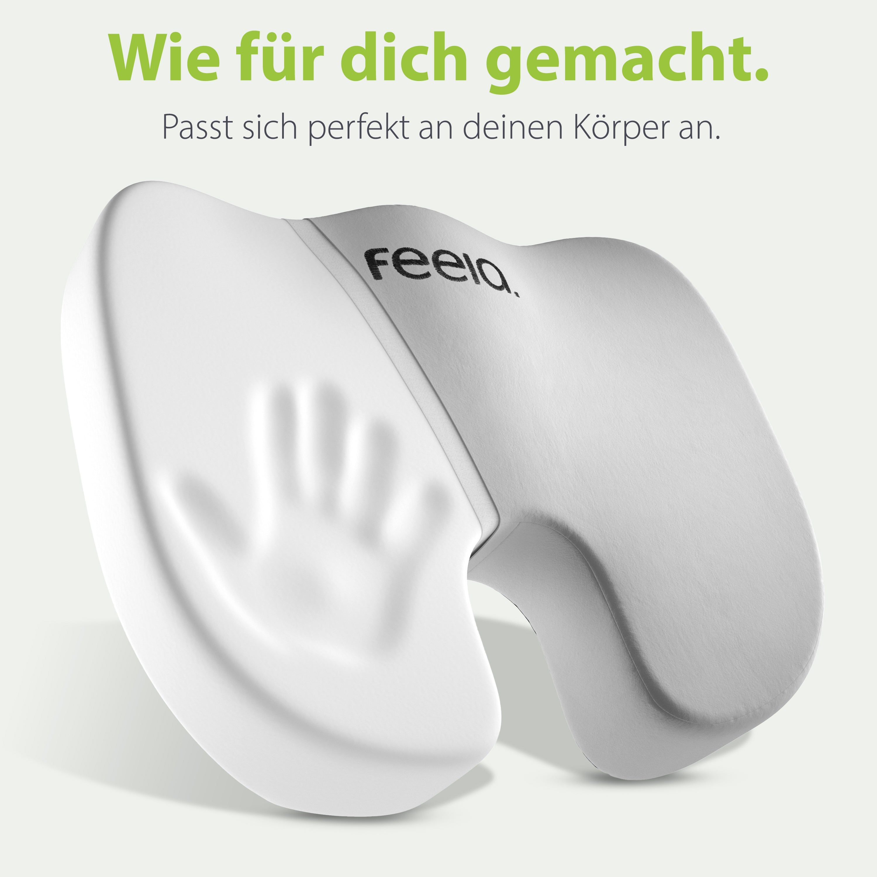 Graues Auto-Sitzkissen mit Handabdruck. Marke: feela.® Text: Wie für dich gemacht. Passt sich perfekt an deinen Körper an.